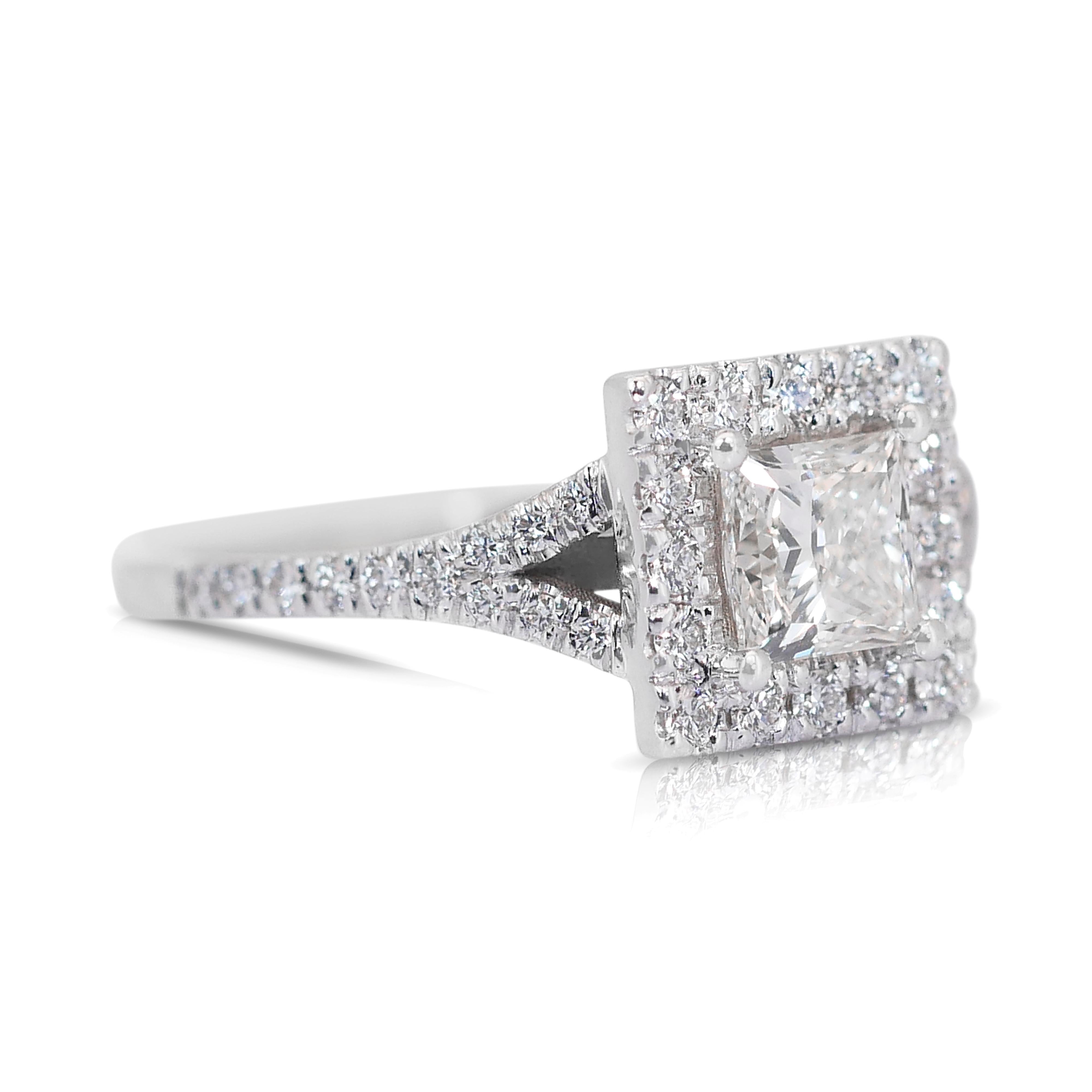 Stunning 1.35ct Double Excellent Ideal Cut Diamonds Halo Ring in 18k White Gold - GIA Certified

Radiate sophistication with this stunning diamond halo ring crafted in 18K white gold. The centerpiece is a breathtaking 1.00-carat square-cut diamond,
