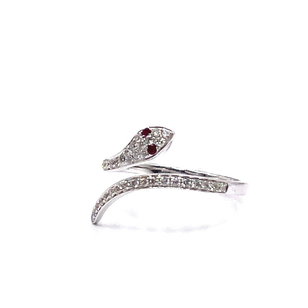 Stunning 14k White Gold Detailed Snake Diamond Ruby Ring

This stunning snake ring weights 2.27 grams is crafted from high-quality solid 14k white gold, featuring intricate details that make it a true statement piece.The snake's body is embellished