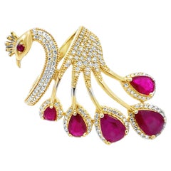 Stunning 14K Yellow Gold Peacock Ring With Ruby
Diamond Accent Stunning 14K Yellow Gold Peacock Ring With Ruby
Diamond Accent