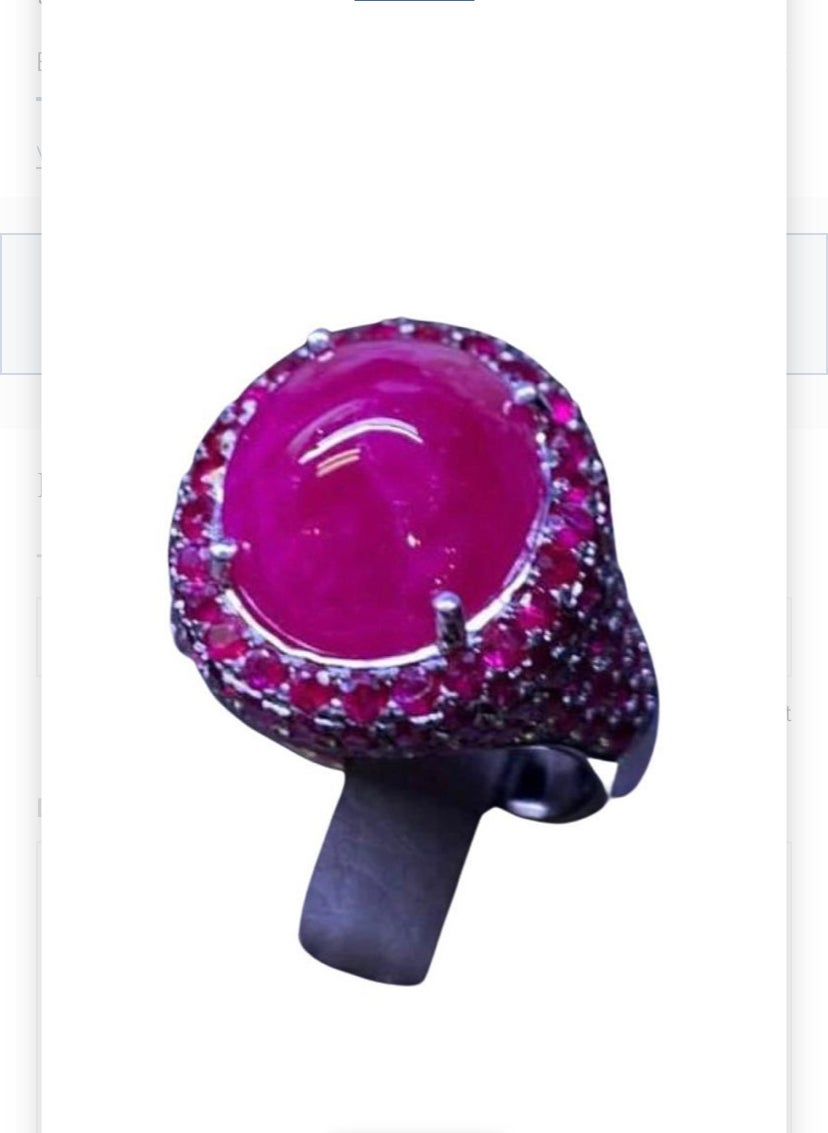 An exquisite contemporary design, so beautiful and elegant.
Ring come in 18k gold with a big natural  Burma ruby in cabochon cut. 10  carat. excellent quality, and natural rubies in round brilliant cut of 5 carats. 
Handcrafted by artisan