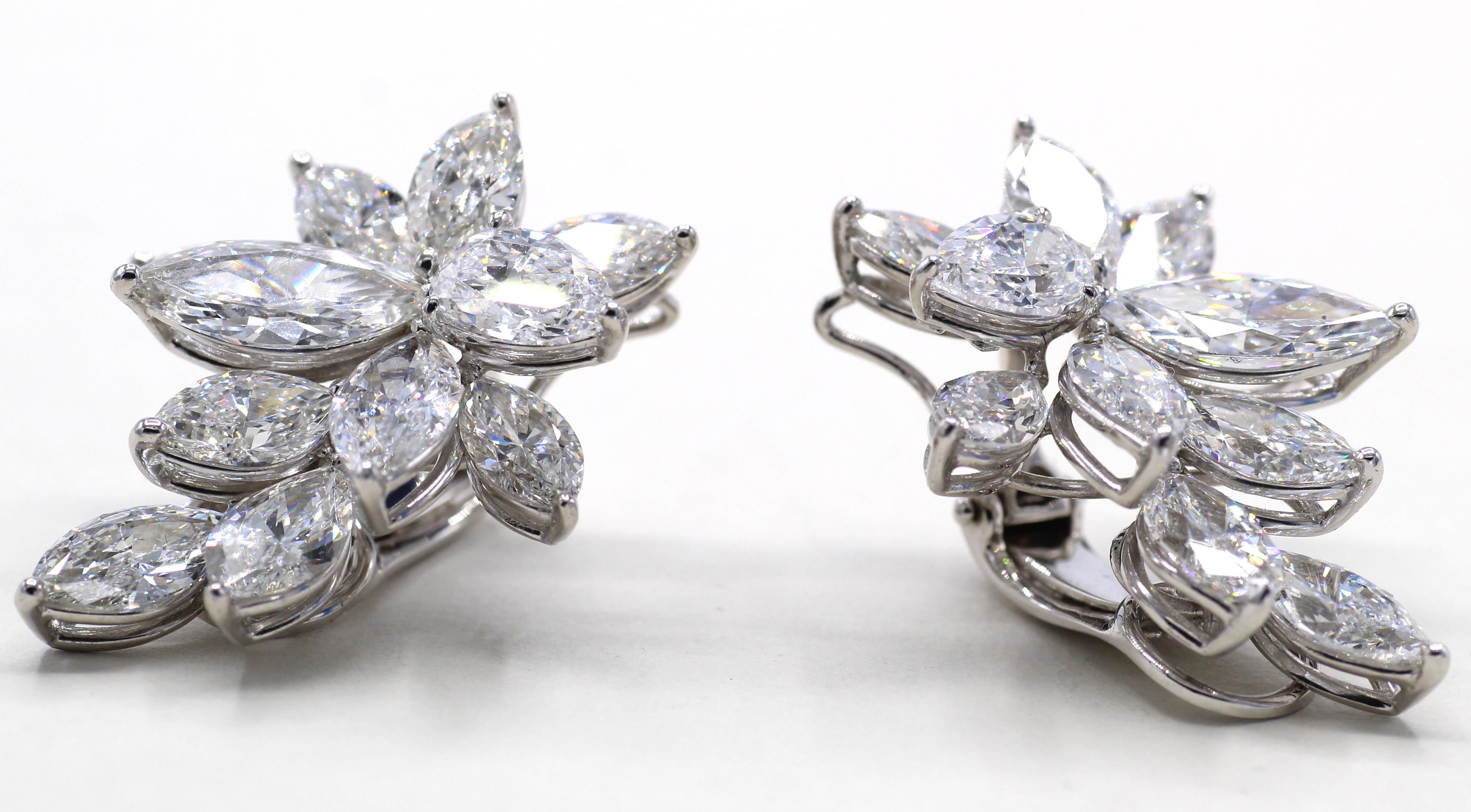 Amazing Winston style platinum diamond ear clips set with a total of 22 - 11 in each earring - marquis shape diamonds with a total weight of 16.58 carats. All diamonds are accompanied by reports from the GIA with only the top colors D, E and F.