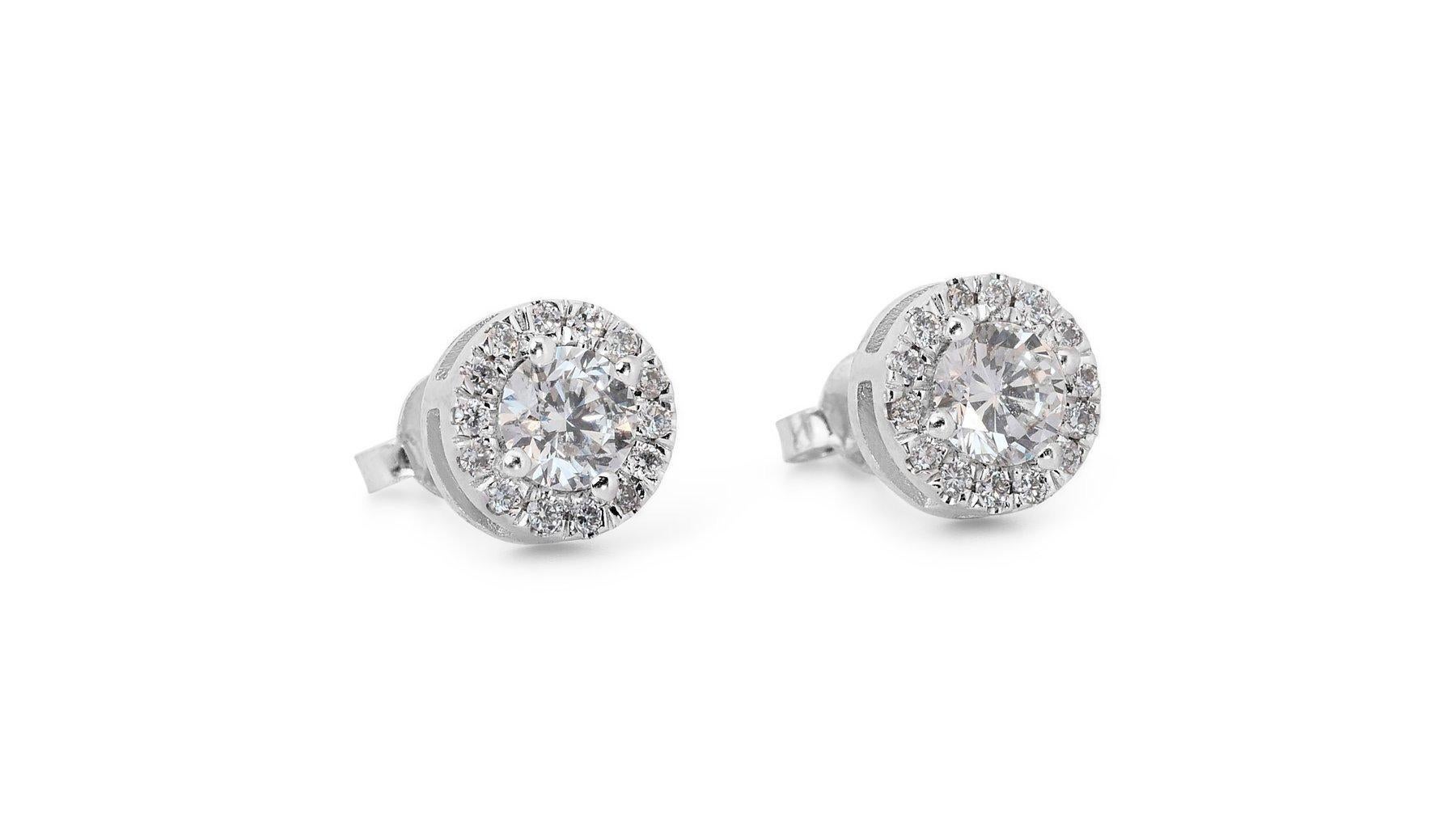 Stunning 1.66ct Triple Excellent Ideal Cut Diamonds Stud Earrings in 18k White Gold - GIA Certified

Elevate your elegance with these exquisite diamond stud earrings crafted in luxurious 18K white gold. Featuring two GIA-certified round brilliant