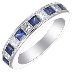 Stunning 18 Karat White Gold, Blue Sapphire, and Diamond Band Ring
