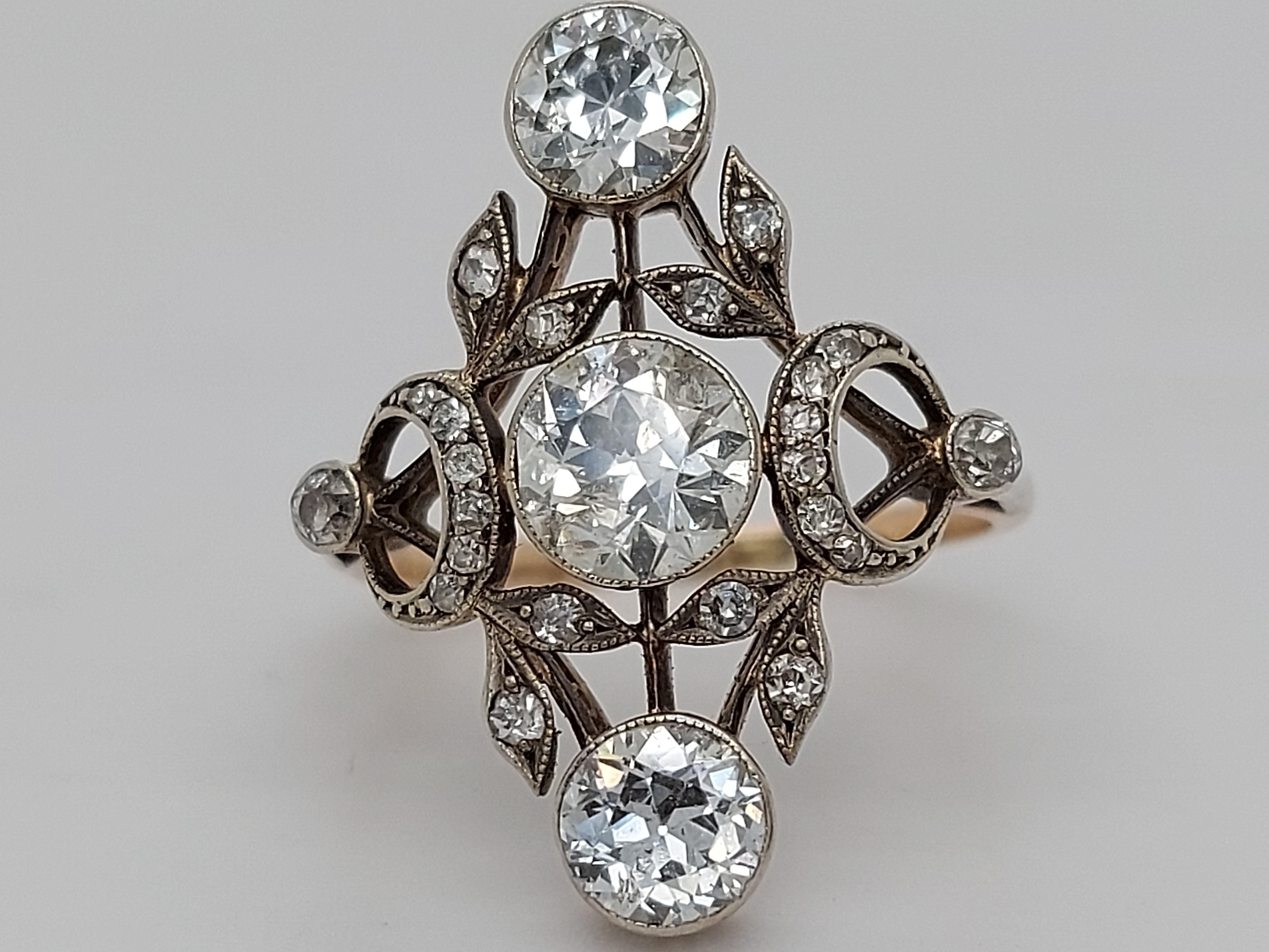 Stunning 18 Karat Gold and Silver Ring with Diamonds from the 1900s, Trilogy For Sale 3