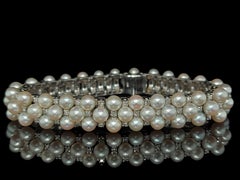 Superbe bracelet en or blanc 18 carats avec perles et diamants