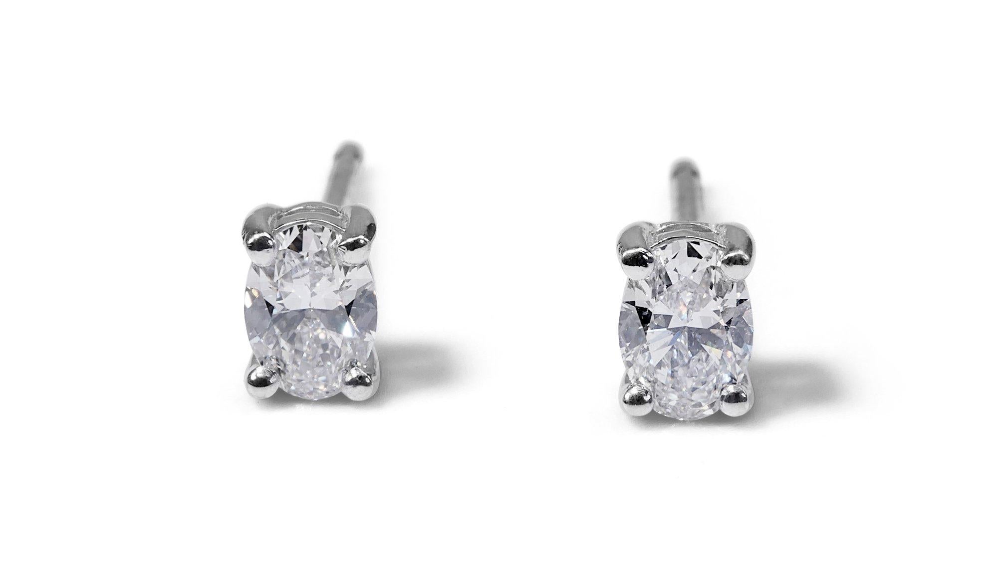 Stunning 18 Kt. White Gold Stud Oval Earrings, 0.62 Ct Diamond, GIA Certficate For Sale 4