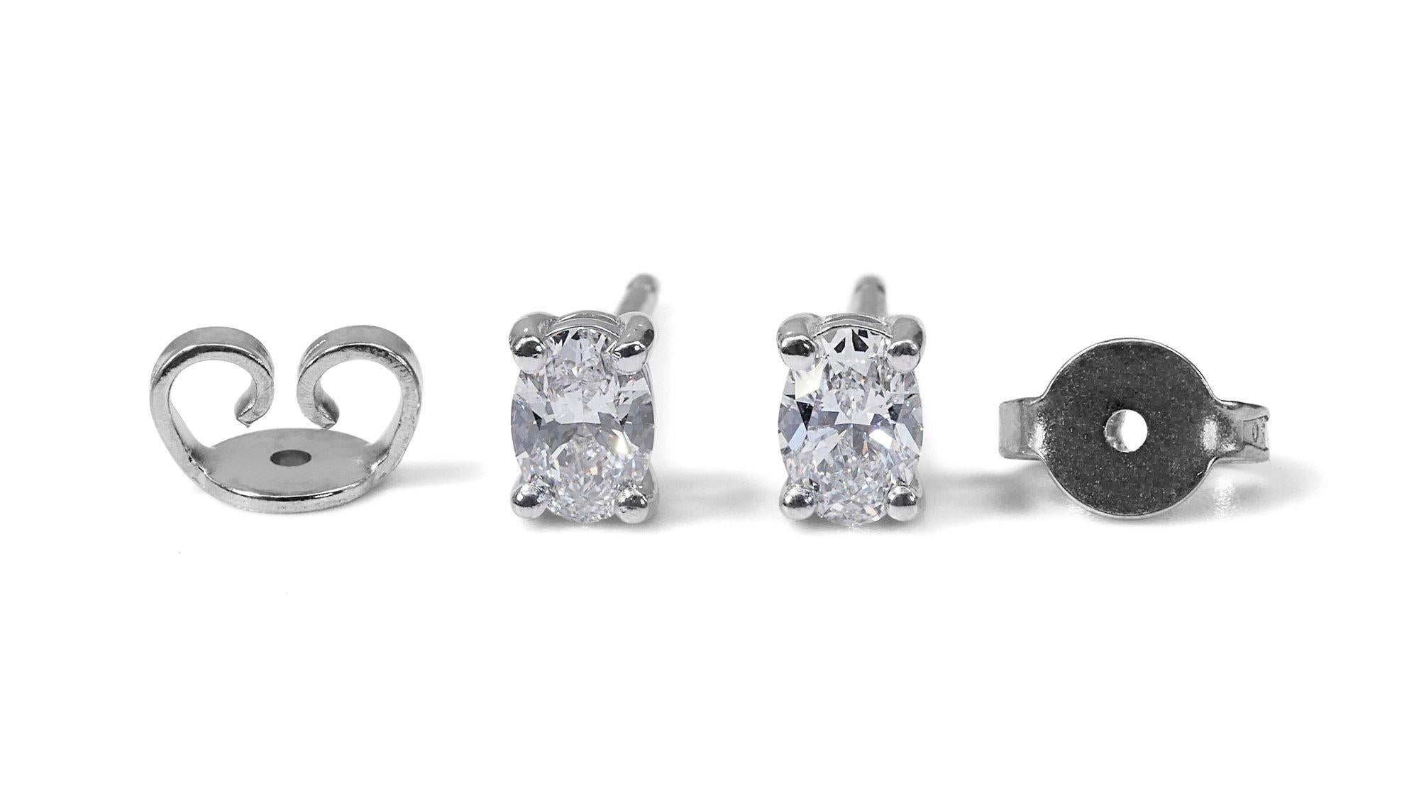 Oval Cut Stunning 18 Kt. White Gold Stud Oval Earrings, 0.62 Ct Diamond, GIA Certficate For Sale