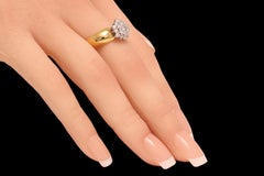 Stupendo anello d'oro giallo e bianco 18 Kt con diamanti incastonati a forma di fiore