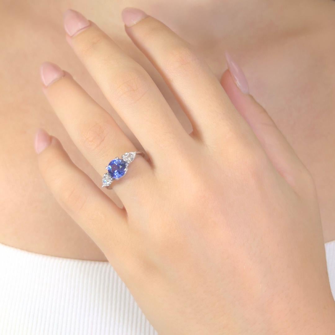 Stunning 1.80ct Tanzanite and Diamonds 3-Stone Ring in Platinum - IGI Certified

A captivating blend of rarity and elegance, this platinum ring showcases a 1.30ct round tanzanite with enchanting violetish-blue tones. Flanking the center stone are