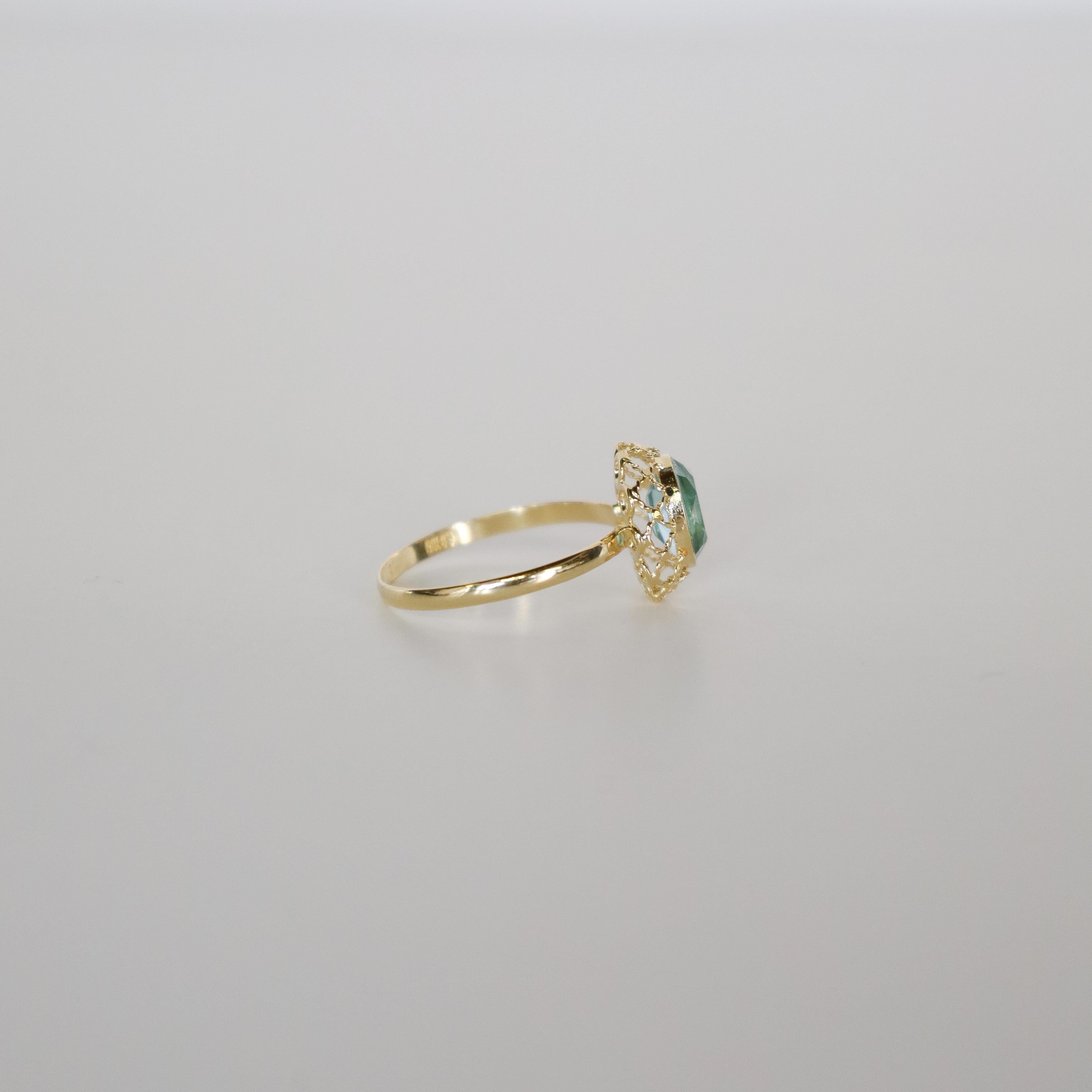 Ring aus 18k Gelbgold mit natürlichem Blautopas im Brillantschliff 2