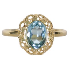 Ring aus 18k Gelbgold mit natürlichem Blautopas im Brillantschliff