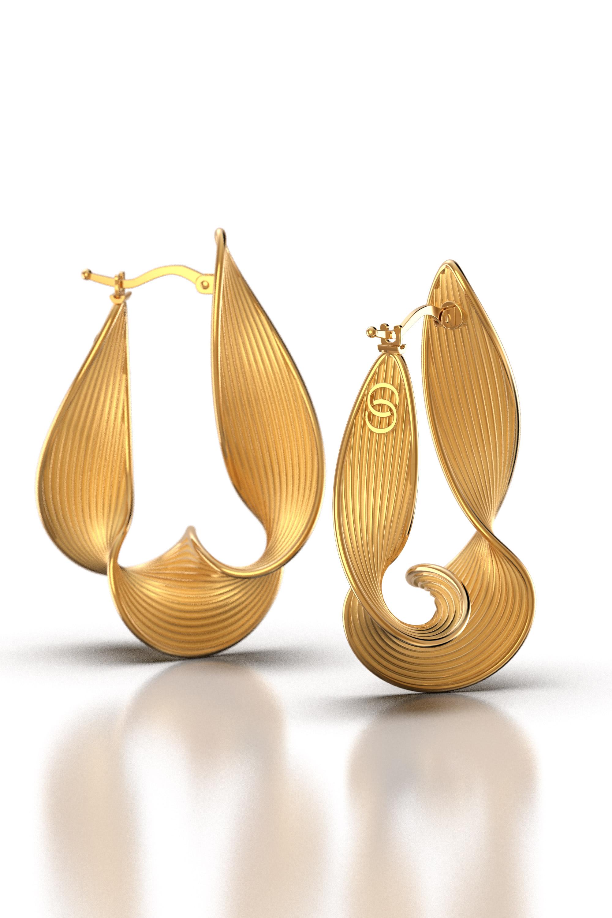 Discover our exclusive made-to-order Statement Twisted Hoop Earrings in 18k gold, meticulously handcrafted in Italy by Oltremare Gioielli. These unique, long twisted hoops feature a captivating ribbed surface and polished edges, embodying a perfect