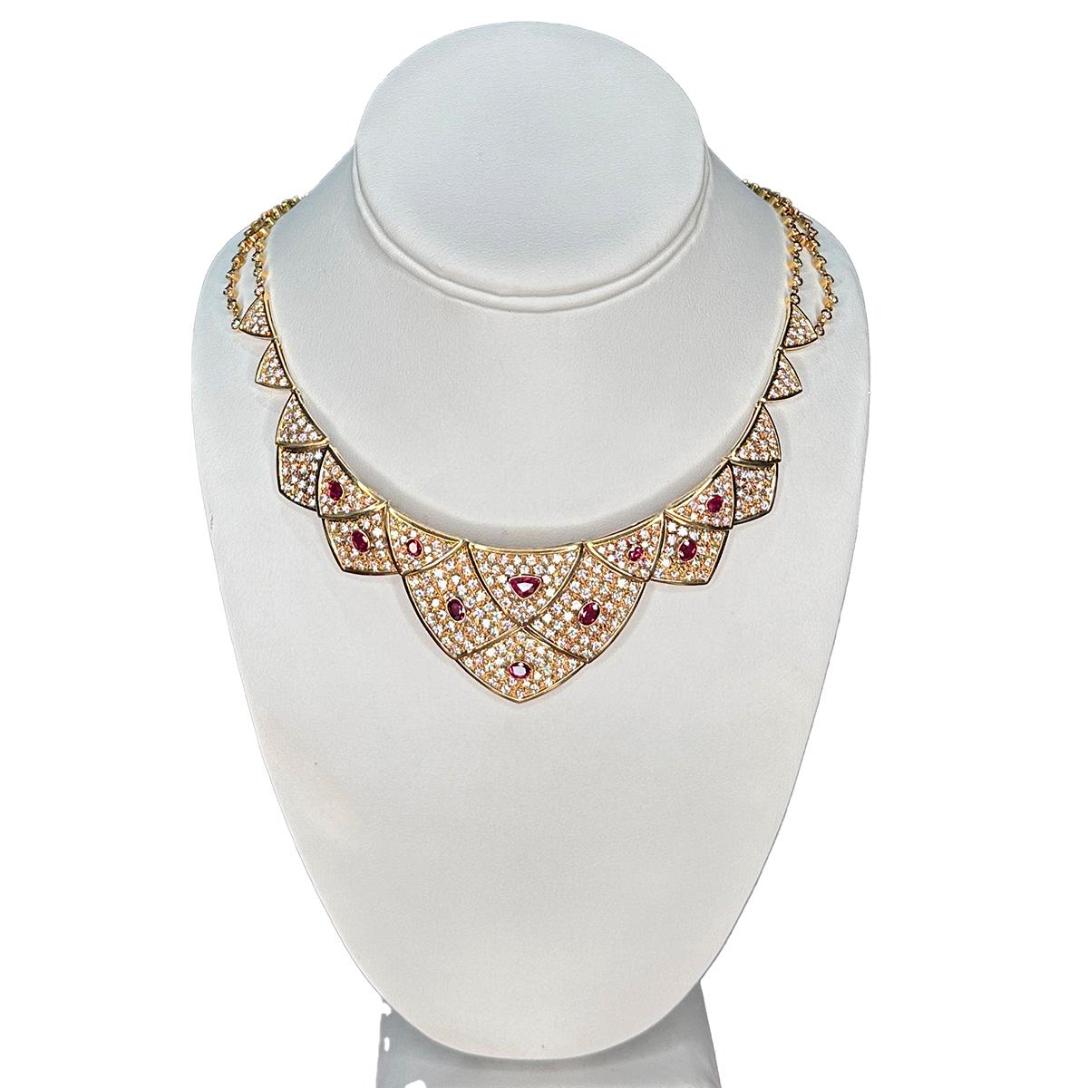 18k Necklace & Bracelet Suite with approximately 17.00 carats of fine diamonds and 7.50 carats of fine rubies.