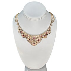 Splendida suite di rubini e diamanti in 18 carati