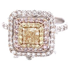 Superbe bague halo de diamants en or blanc 18 carats