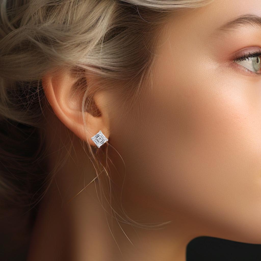 Eine schöne Ohrringe mit einem schillernden 1,4 Karat Bogenschliff oder quadratische Smaragd Diamanten Diamanten.

Das Schmuckstück ist aus 18 Karat Weißgold mit einer hochwertigen Politur gefertigt. Er wird mit GIA-Zertifikat und einer schicken