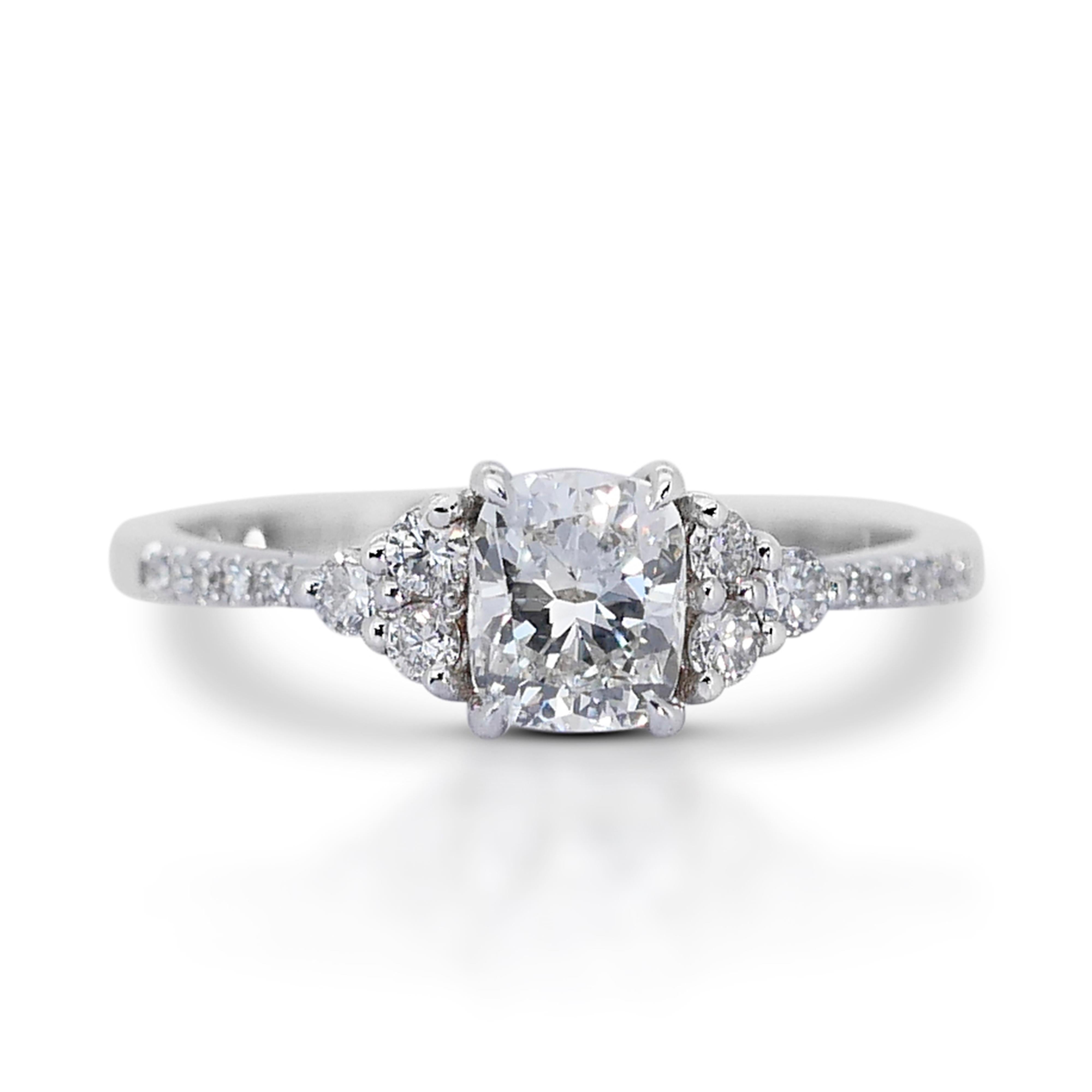 Stunning 18K White Gold Ideal Cut Natural Diamond Ring w/1.73ct

This exquisite ring features a breathtaking 1.73 carat natural diamond, expertly cut to ideal proportions to maximize its brilliance. The dazzling center diamond, with its ideal cut,