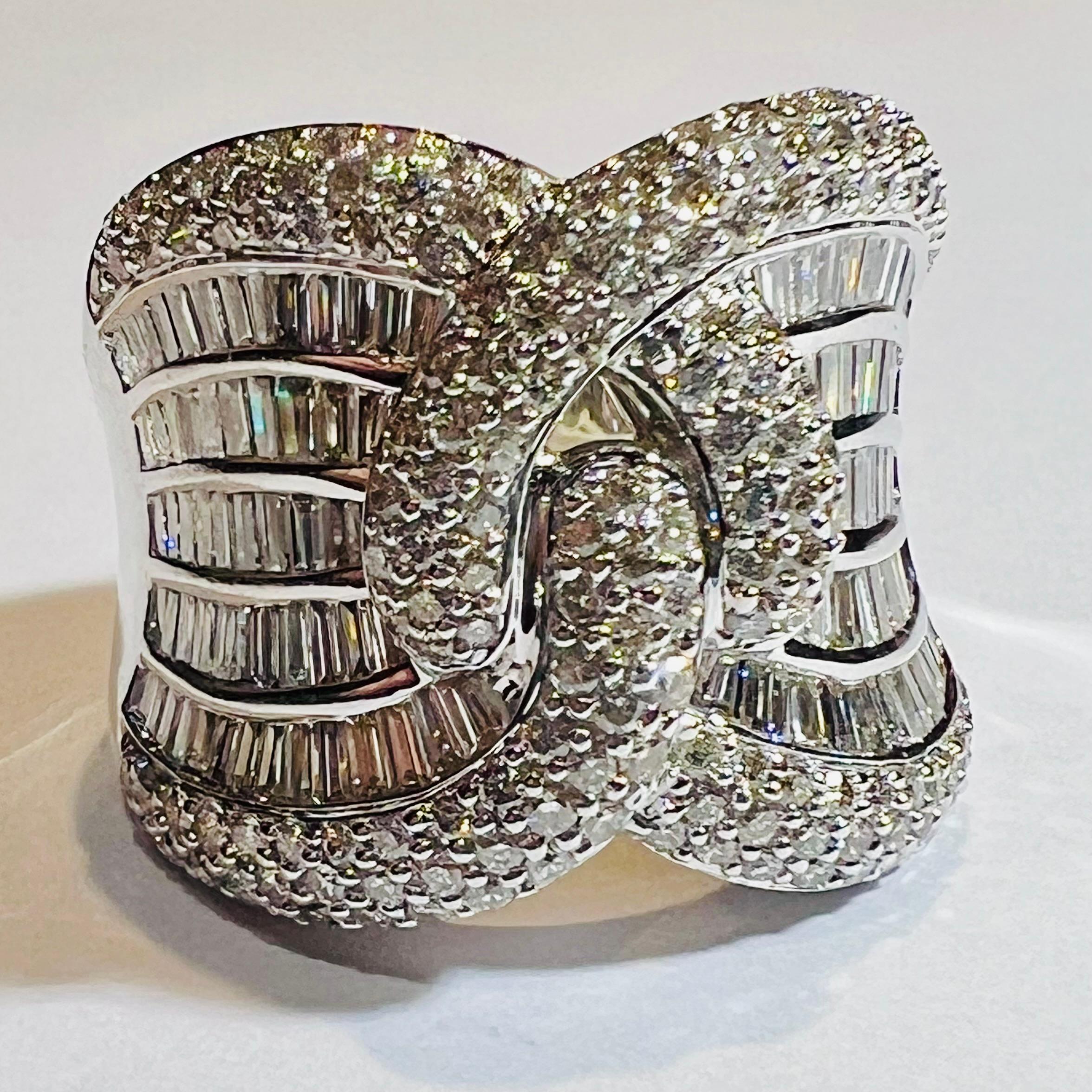 This remarkable 18K white gold ring features a sophisticated knot design, adorned with approximately 4.00 carats of natural diamonds—a luxurious combination of baguette-cut and round brilliant diamonds. The craftsmanship is exceptional, with