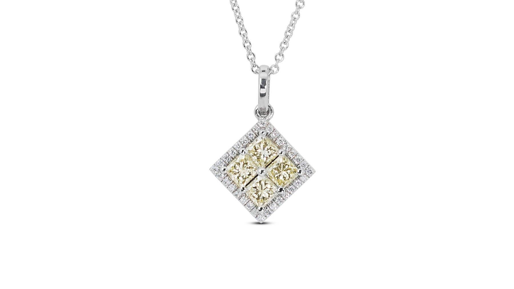 This stunning 18K white gold pendant with chain features a dazzling 1.04 carat princess cut natural diamond, flanked by 32 smaller round brilliant diamonds for a truly eye-catching piece of jewelry. The center diamond is certified by IGI as Natural