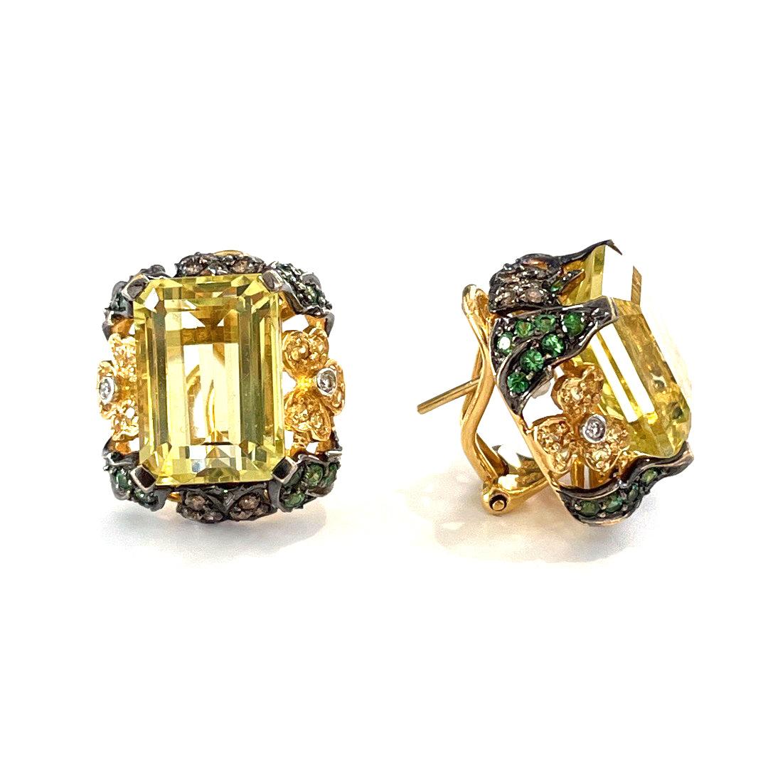 Elevate your jewelry collection with these . Each earring features a breathtaking citrine stone that is expertly cut to enhance its natural beauty. The citrine stones are surrounded by a halo of sparkling diamonds, adding a touch of glamour to the