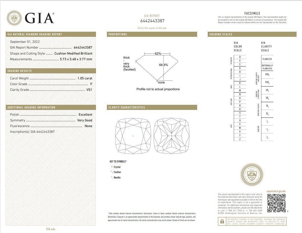 A beautiful classic halo ring with a dazzling 1.05 carat Cushion Modified natural diamond in F VS1 quality and ideal cut what's means extremely bright and sparkles Natural Diamond. The jewelry is made of 18k yellow gold with a high quality polish.