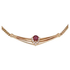 Splendida collana in oro giallo 18k con rubino naturale e diamanti da 0,14 carati