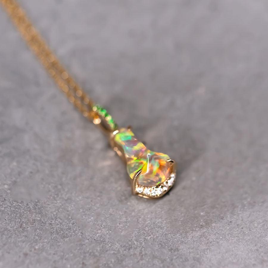 Stunning 18K Yellow Gold Pendant Necklace with Mexican Fire Opal, Diamond, and Tsavorite.


Free Domestic USPS First Class Shipping! Free Gift Bag or Box with every order!

Opal—the queen of gemstones, is one of the most beautiful gemstones in the