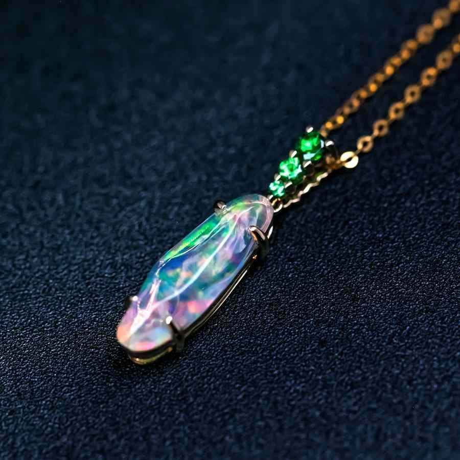 Stunning 18K Yellow Gold Pendant Necklace with Mexican Fire Opal and Tsavorite.


Free Domestic USPS First Class Shipping! Free Gift Bag or Box with every order!

Opal—the queen of gemstones, is one of the most beautiful gemstones in the world.