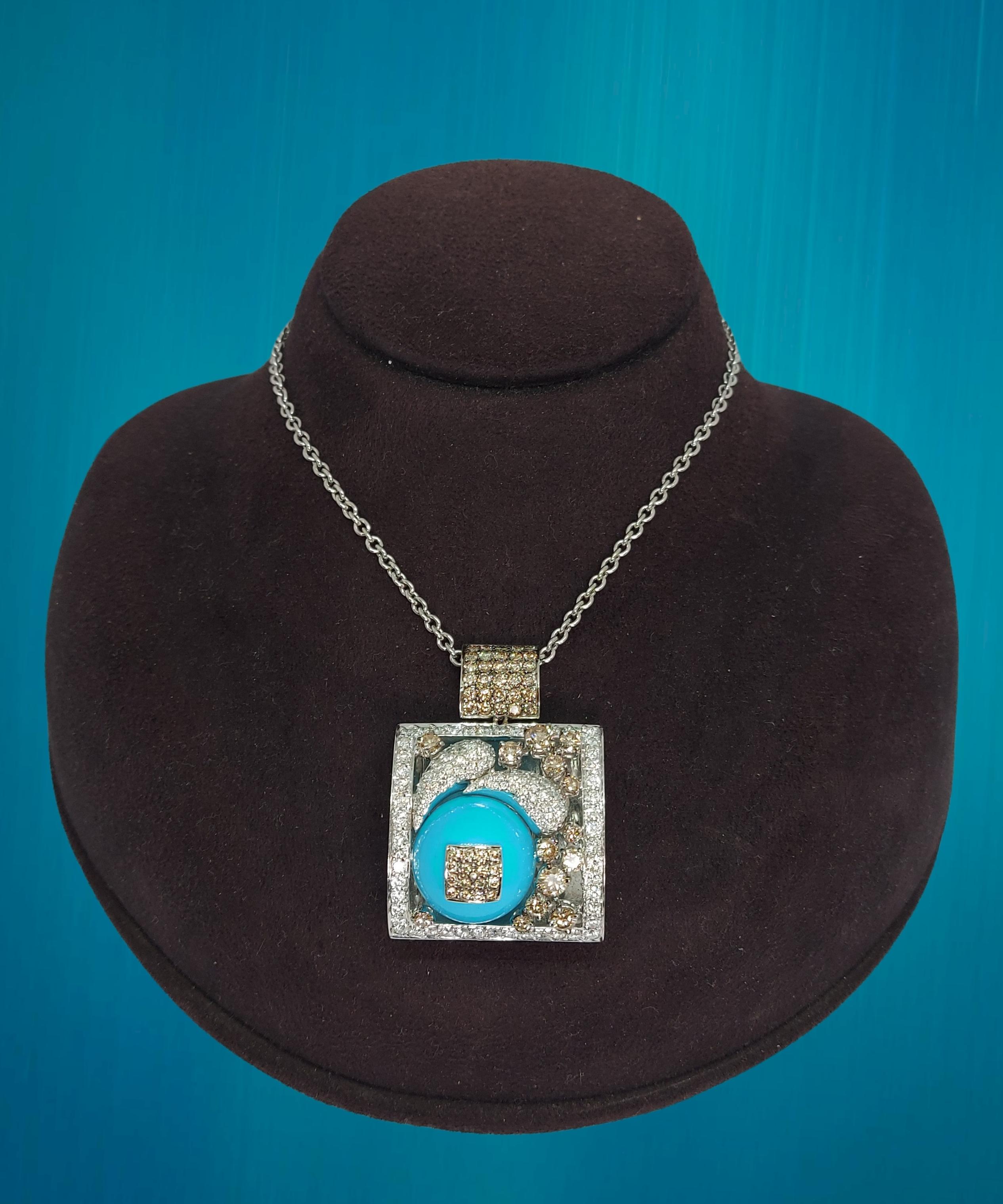 Rare and Beautiful 18kt White Gold Pendant / Necklace with Turquoise and Diamonds

The necklace chain is 43cm long

Turquoise ball: diameter 20 mm

Brown diamonds: 59

White diamonds: 126

Material: 18kt White Gold

Total weight: 51.8 gram / 1.820