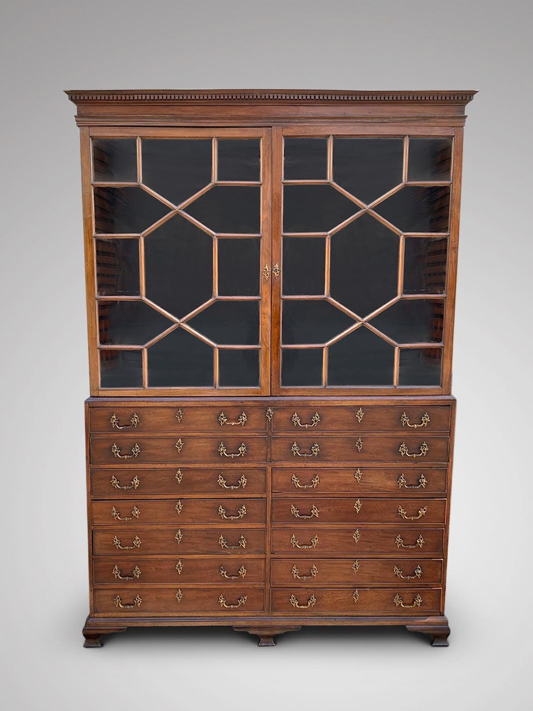 A stunning 18th century, George III period mahogany secretaire bookcase . Well proportioned mahogany bookcase with glazed 2-door cabinet over a set of 14 oak lined drawers base with a fitted fall-front secretaire writing drawer, raised on the