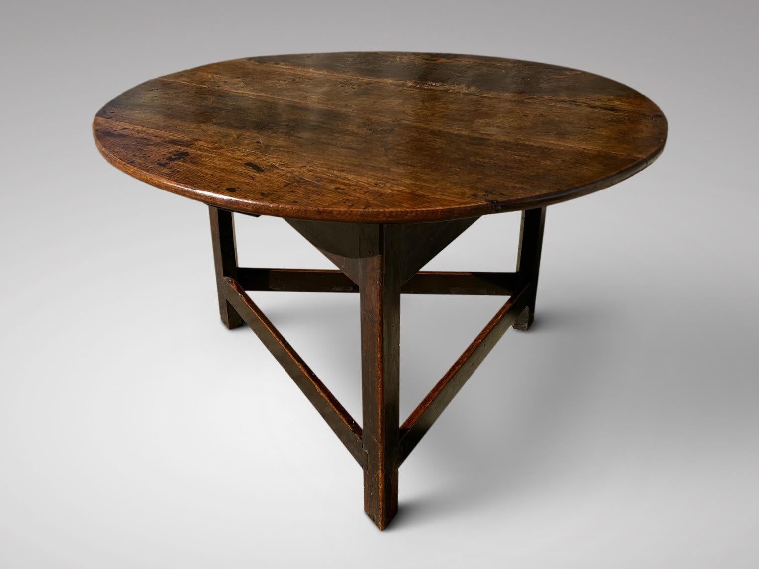 We are delighted to offer for sale this larger than usual and more robust model of an 18th century Georgian antique cricket table made in solid oak with thick top. With a wonderful patina and original colour. All pegged construction and with a