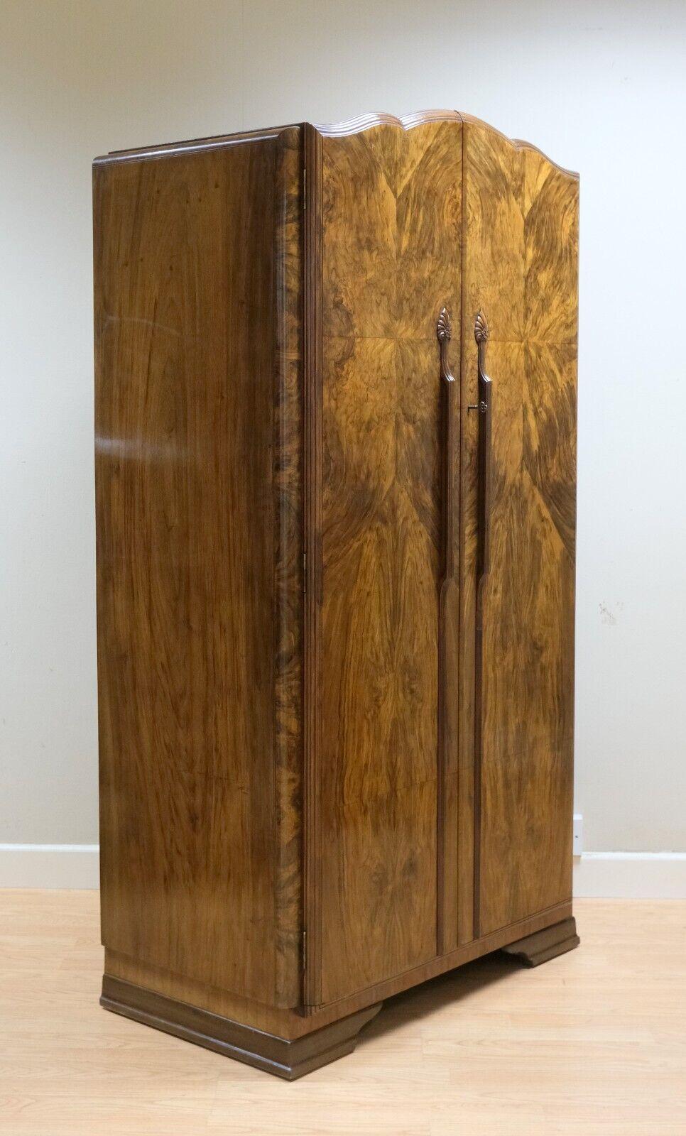 We are delighted to offer for sale this stunning 1920's Art Deco burr walnut small wardrobe with shelves and hanging rail.

This piece is in stunning burr walnut with original handles from the Art Deco period. It is a very nice compact size, ideal