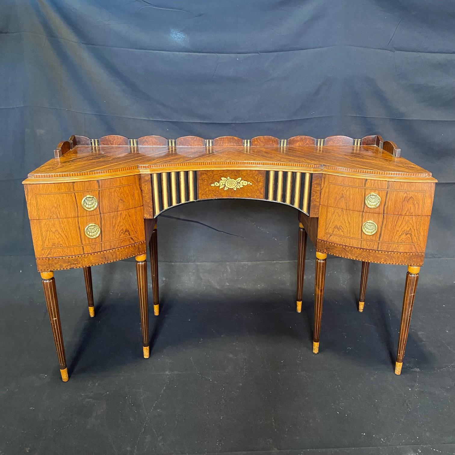 An elegant, stately, hand painted rosewood dressing table and matching chair in great condition from the famous Robert W. Irwin furniture company. This was probably made between 1920-1933 after artist Frank J. Davidhazy was hired to come from NYC to