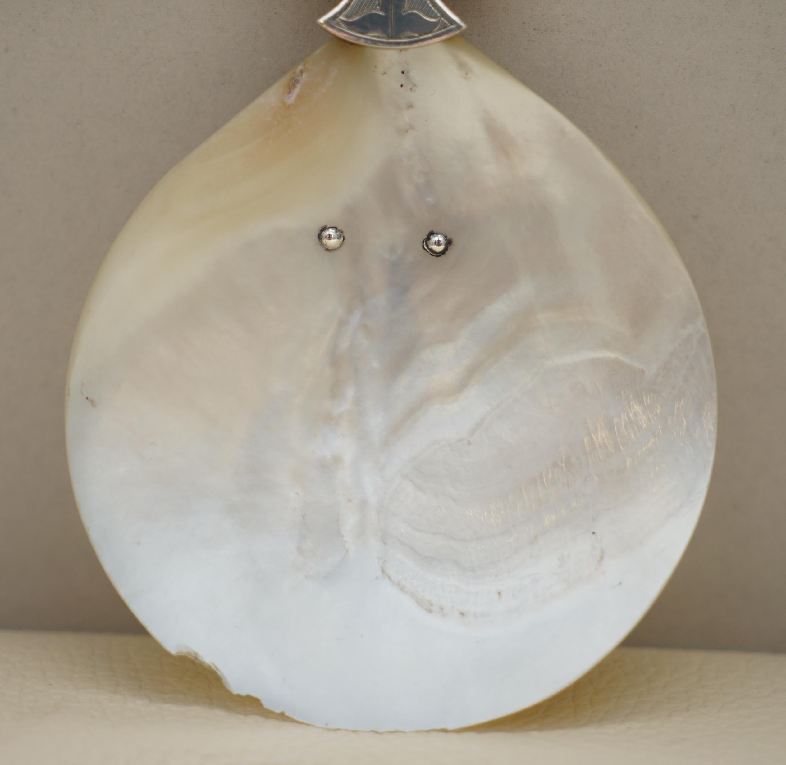 silver baptismal shell