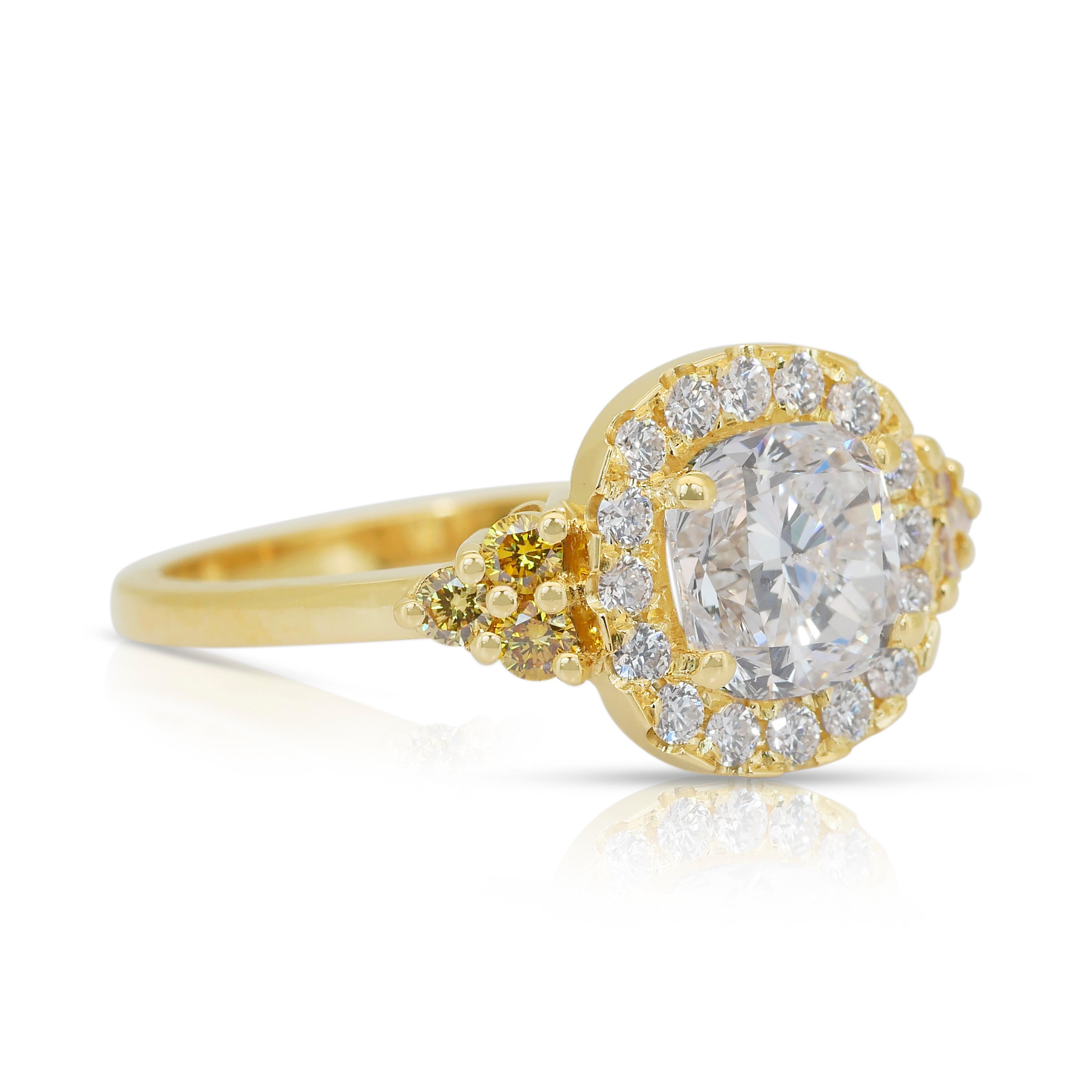 Stunning 1.93ct Diamonds Halo Ring in 18k Yellow Gold - IGI Certified

This breathtaking 18k yellow gold halo ring showcases a stunning 1.51-carat cushion-cut diamond, ensuring remarkable brilliance. Enhancing its elegance, 16 round diamonds with