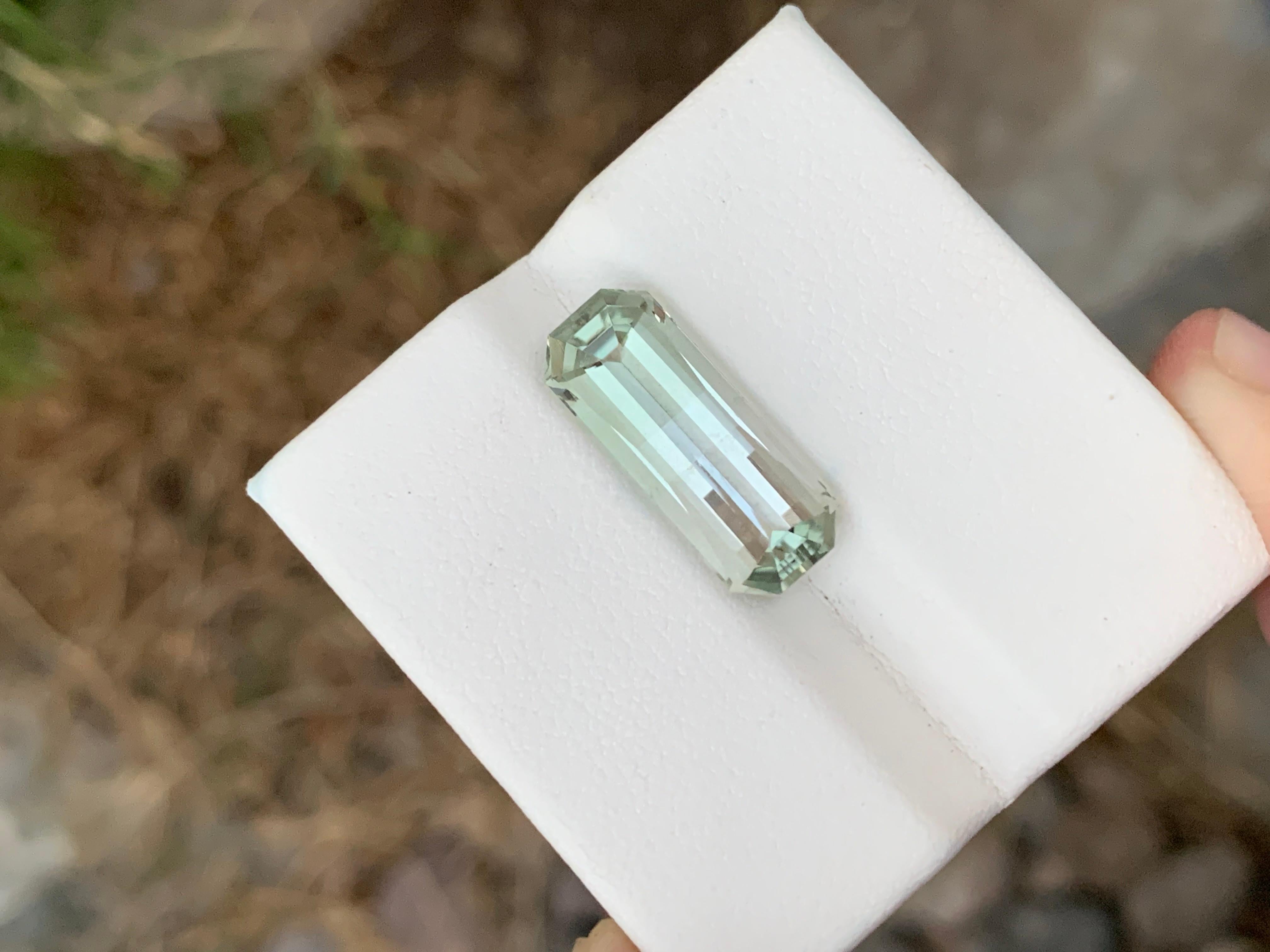 Faceted Amethyst 
Weight: 7.05 Carats 
Dimension: 19.5x7.7x6.5 Mm
Origin: Brazil
Color: Green
Shape: Emerald 
Cut/Facet: Pixel Cut / Smith Bar Cut
Certificate: On Customer Demand 
Green amethyst, also known as prasiolite, is a captivating gemstone
