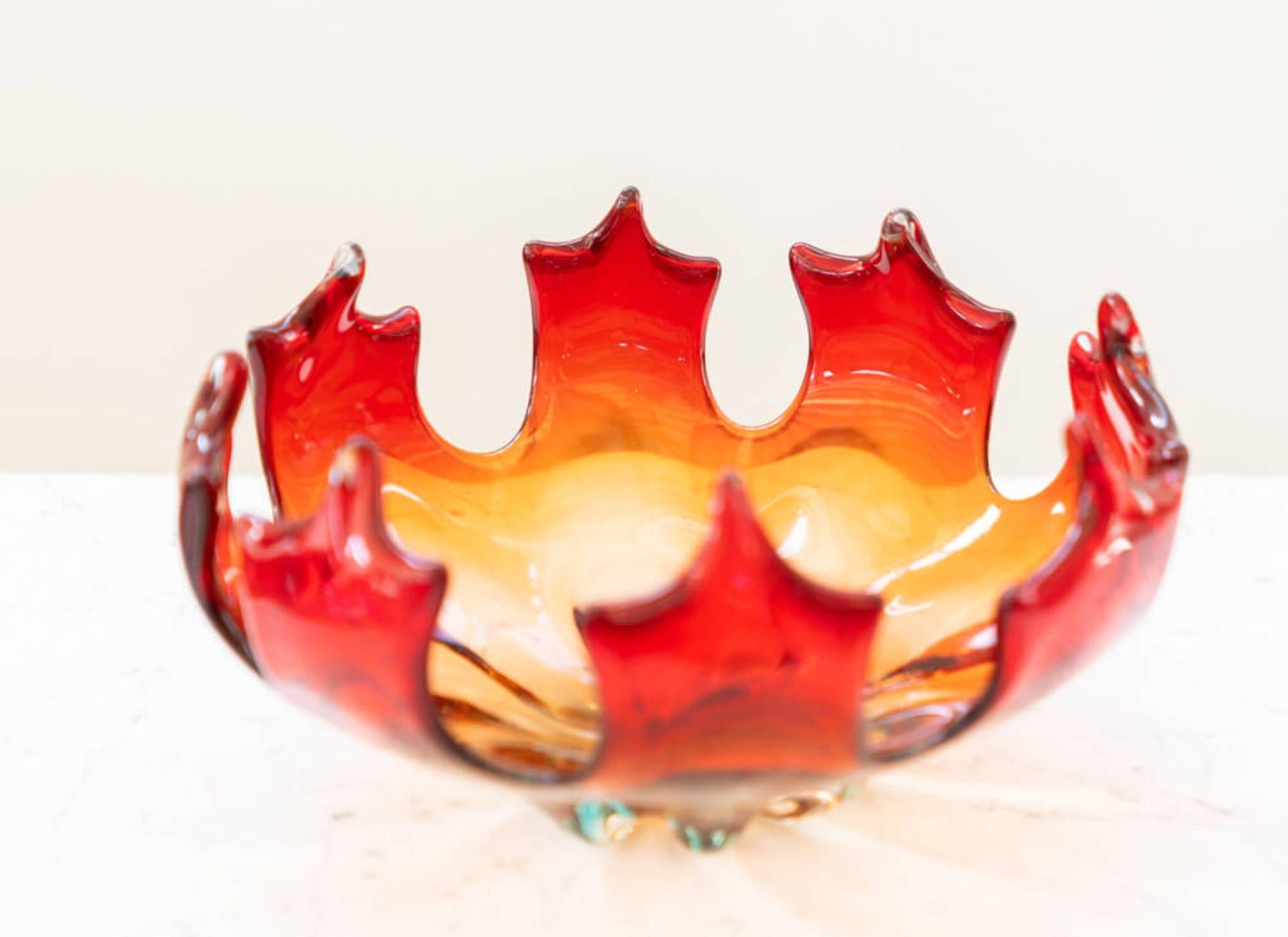 Stunning 1950s Red Glass Centerpiece - Mid-Century Elegance

Elevate your dining experience with this striking 1950s red glass centerpiece. Exemplifying mid-century elegance, this piece adds a vibrant pop of color to any table setting. The deep,