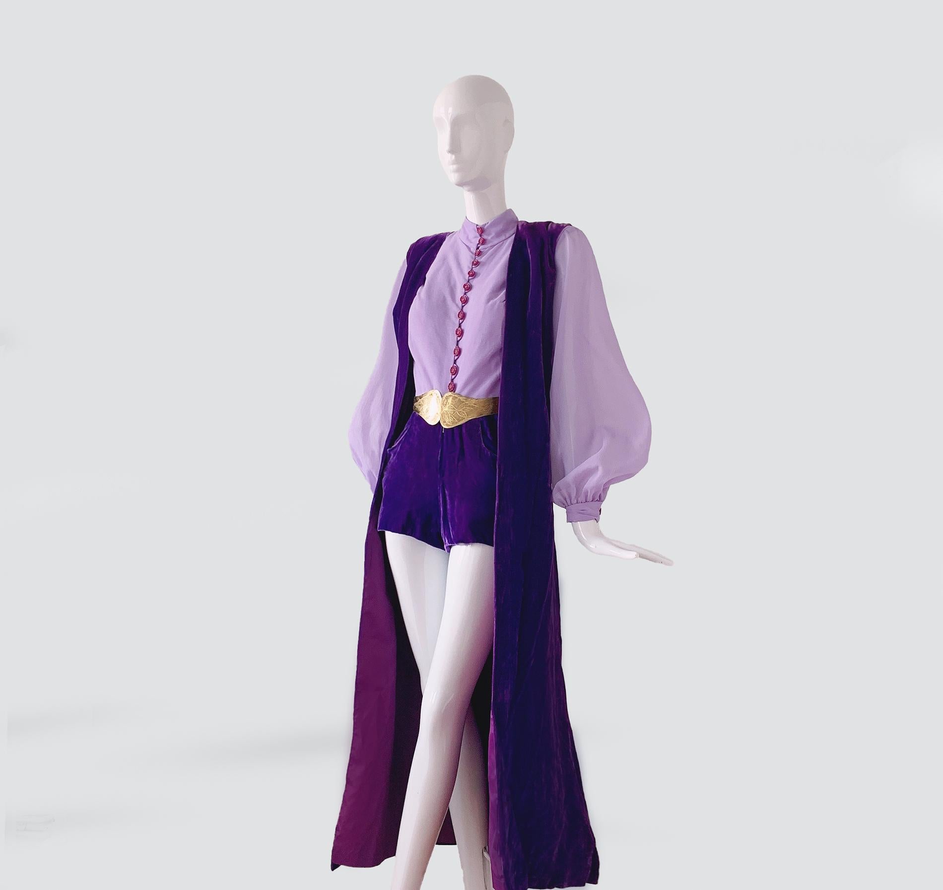 
So obsessed with this fabulous look!! A GORGEOUS one of a kind 1970s Glam two piece Ensemble in shades of purple/lilac  (belt not included).
Absolutely iconic and soo strong 70s glam vibes. Sexy mini romper with light pastel lilac blouse top and
