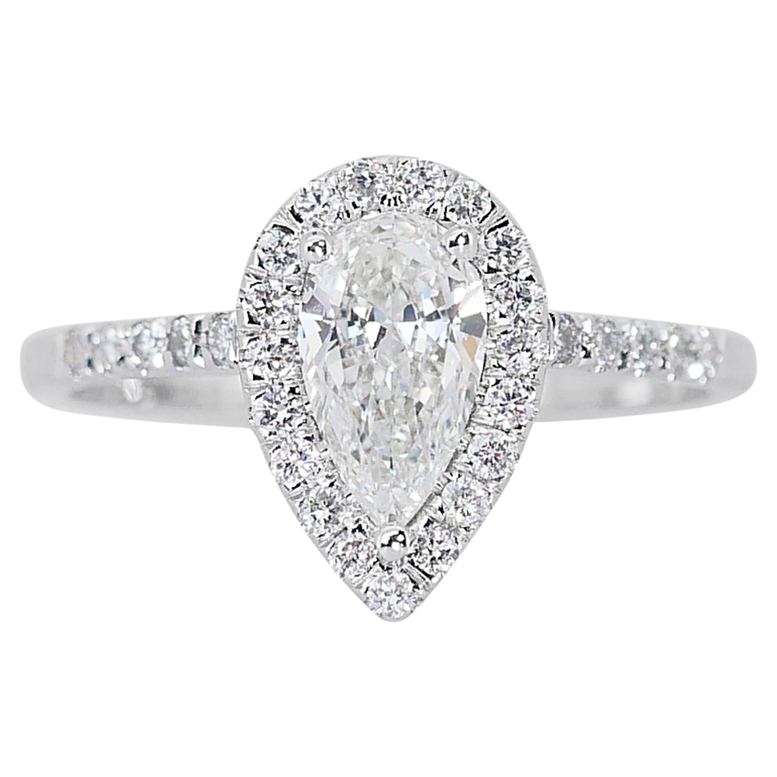 Stunning 1.97ct Pear-Shaped Diamond Halo Ring in 18k White Gold - GIA Certified

This captivating diamond halo ring, crafted in sleek 18k white gold, features a remarkable 1.50-carat pear-shaped diamond that radiates unmatched brilliance.