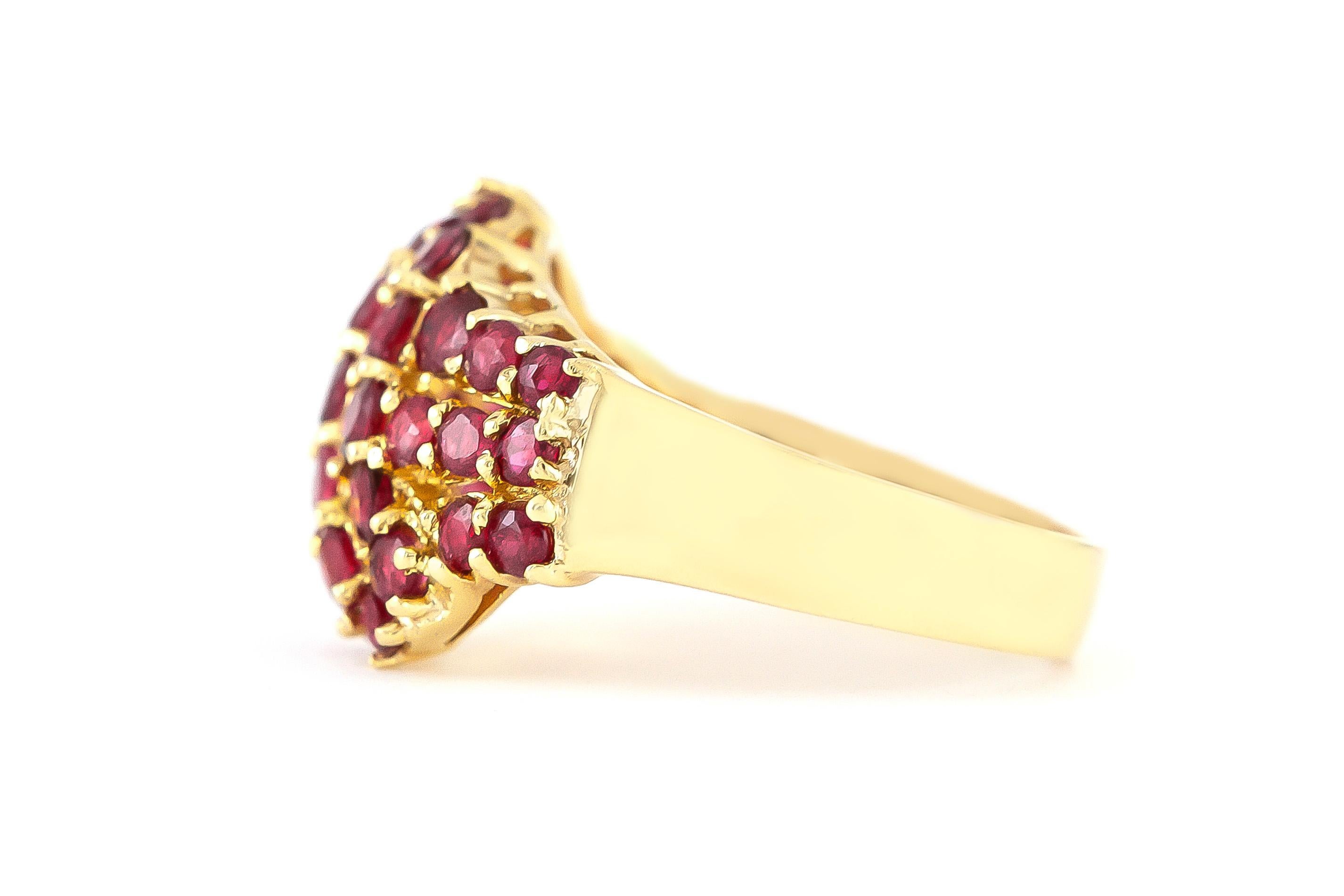 Finely crafted in 14k yellow gold with rubies on the center weighing approximately a total of 3.20 carats.
Circa 1980.
Size 7 1/4, resizable