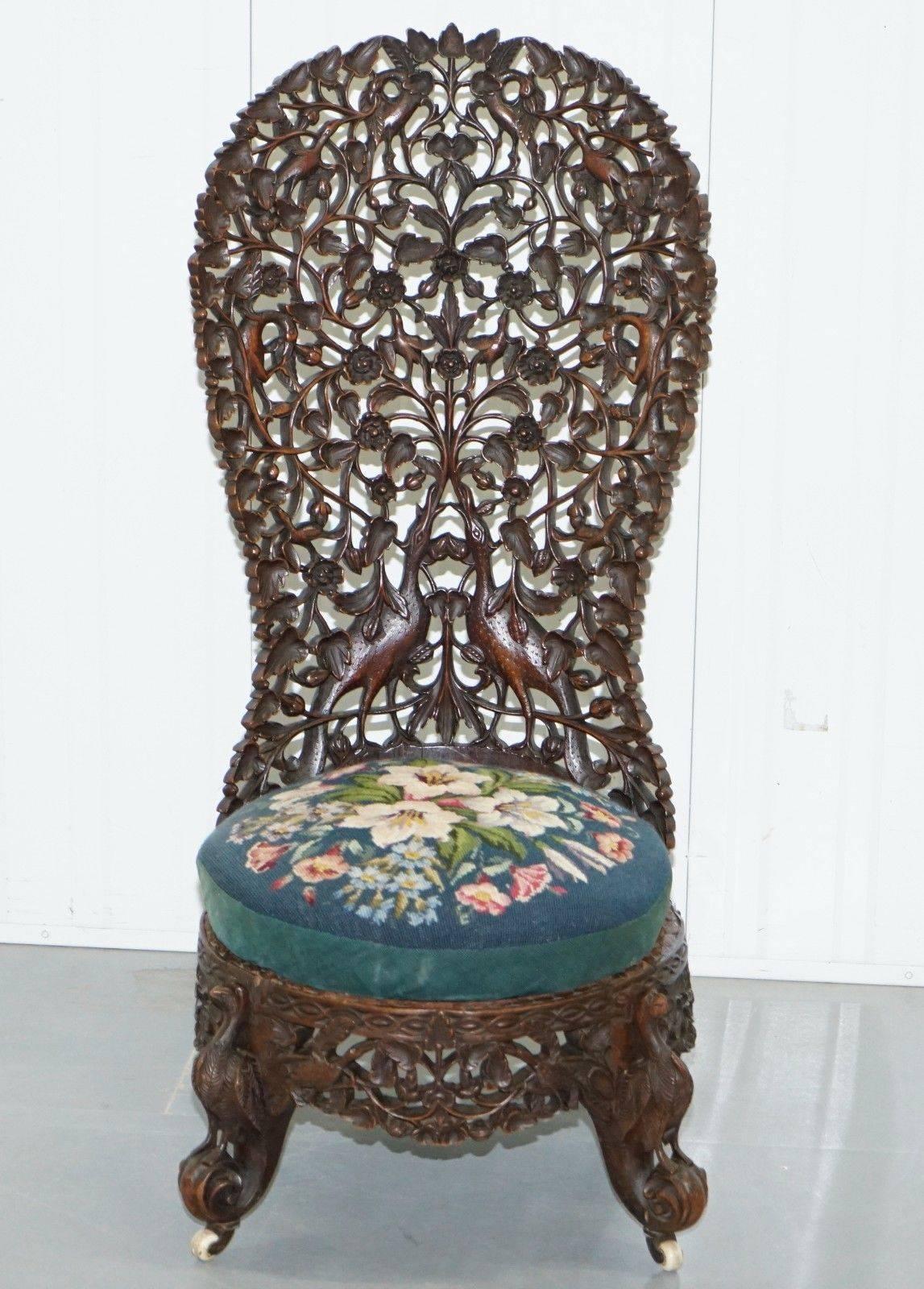 We are delighted to offer for sale this original, circa 1870 Burmese hand-carved depicting birds and flowers from top to bottom nursing spoon back chair

A very good looking and well made period piece, extremely carved from all angles, front to