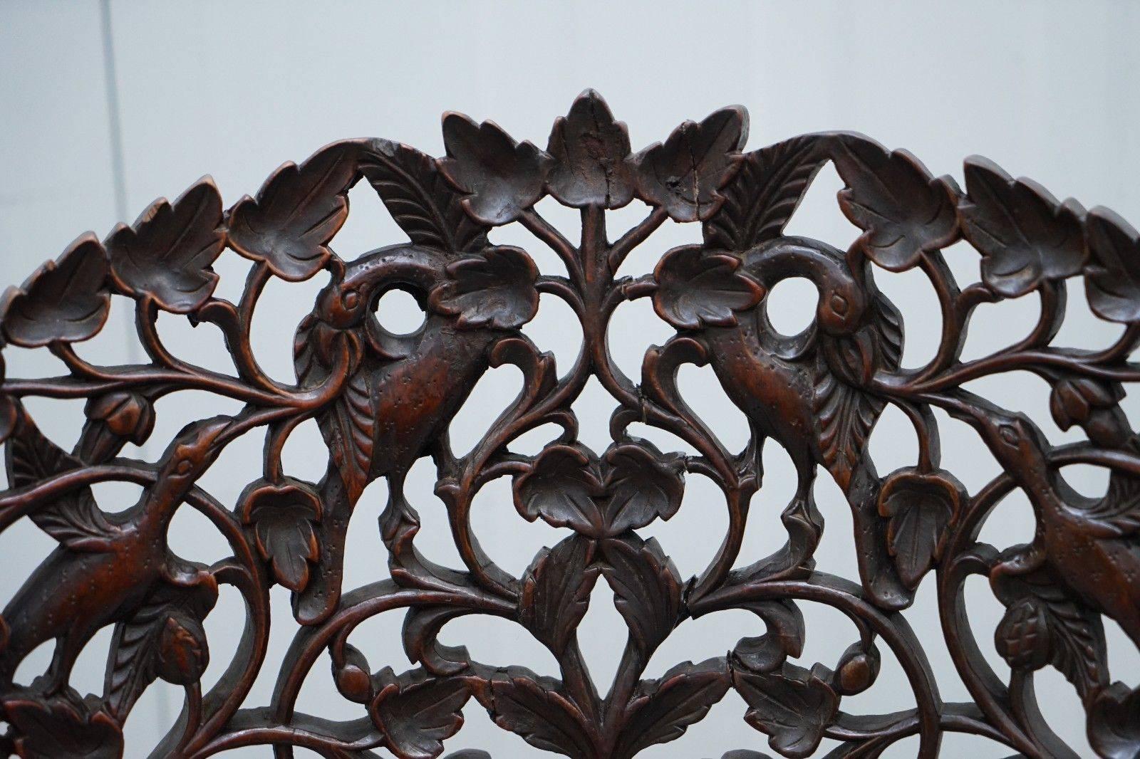 Anglo-Indian Stunning 19th Century Burmese Hand-Carved Nursing Chair Birds & Flowers All over