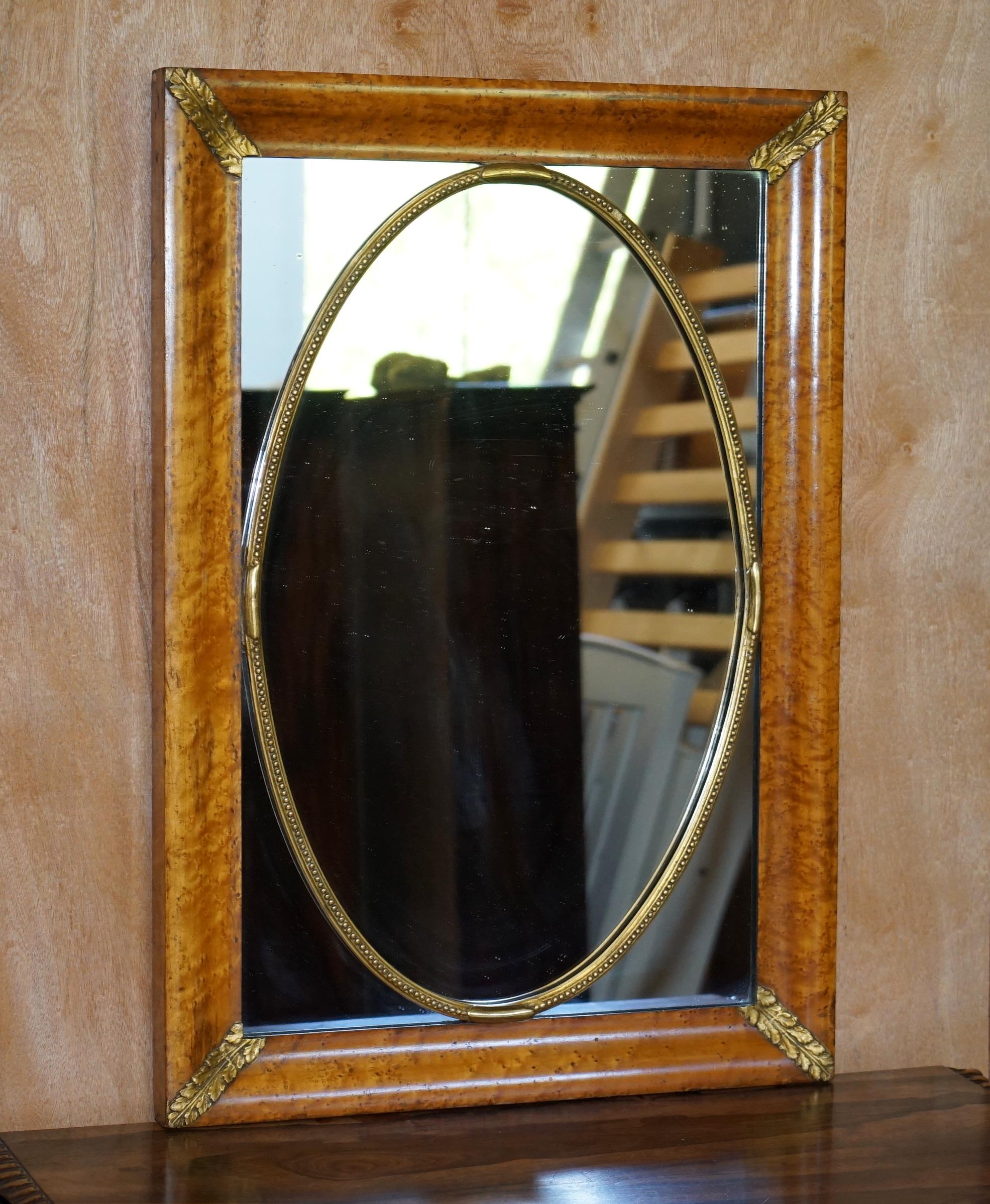 We are delighted to offer this stunning hand made circa 1860 French burr walnut wall mirror with gold leaf giltwood details

A very decorative and fine French 19th century mirror. This piece looks sublime from every angle, it has a real