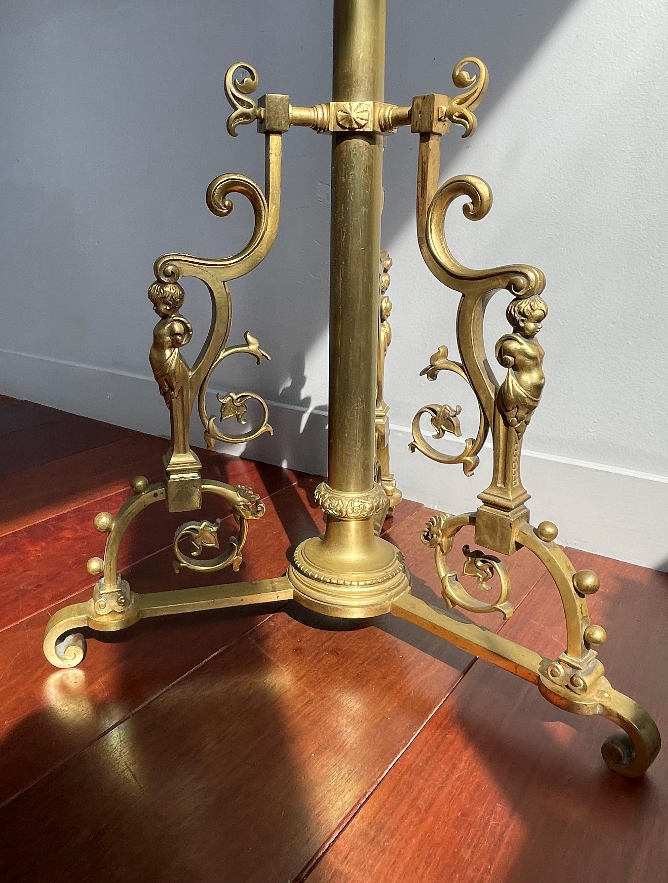 Unique and great design, antique bronze oil lamp with angel sculptures, by one of Europe's finest.

There is a reason why the late 19th and the early 20th century have produced some of the best furniture makers, lamp designers, sculptors, wood