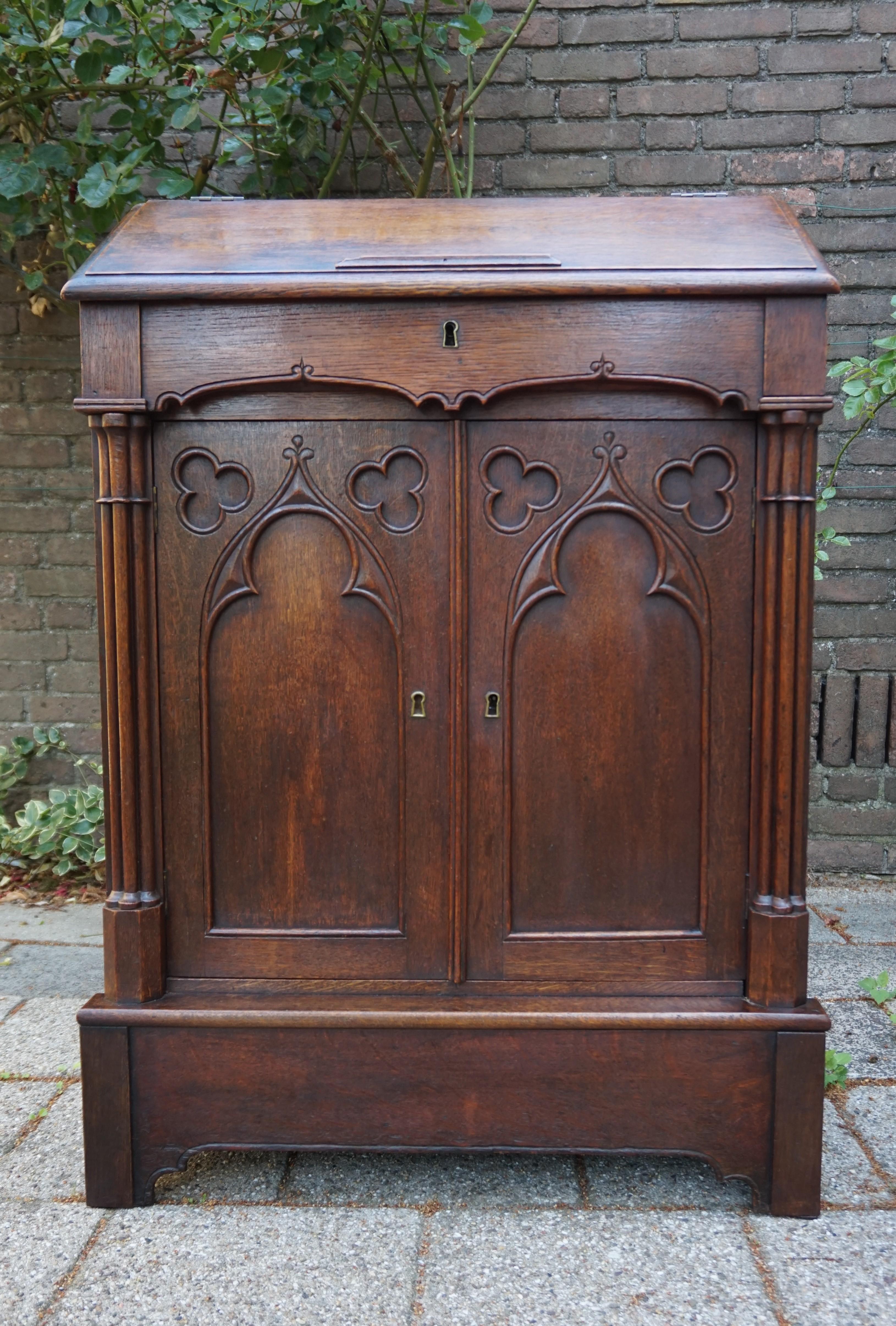 Handcrafted and hand carved, two-door lectern stand.

In our view there are at least five very good reasons why you should want to own this unique and stunning Gothic lectern. First of all, the design is simply marvelous and aesthetically very