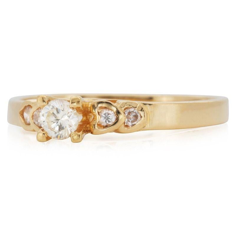 A beautiful ring with a dazzling 0.12 carat round brilliant natural diamonds. It has 0.04 carat of side diamonds which add more to its elegance. The jewelry is made of 20k yellow gold with a high quality polish. It comes with a fancy jewelry box.

1