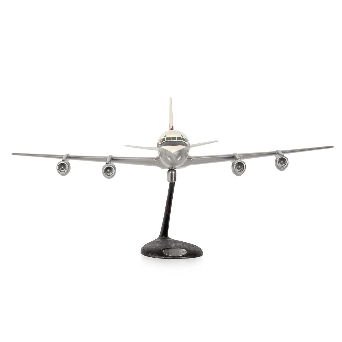 A stunning model of an airplane (USA, Douglas DC-8), made of aluminium and hand painted, crafted to the last detail.