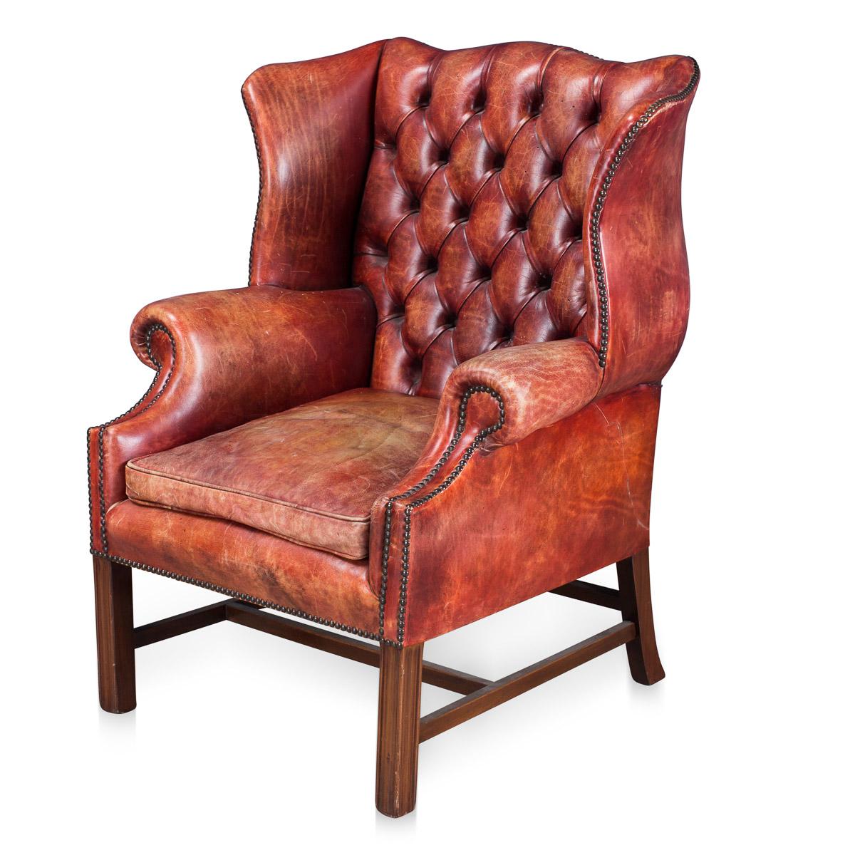 A lovely example of English leather craftsmanship. Dating to the early to mid-20th century, this leather wing-back armchair has a beautiful deep red colour, great proportions and lovely patina.
Condition

Some discolouration and tiny holes (about