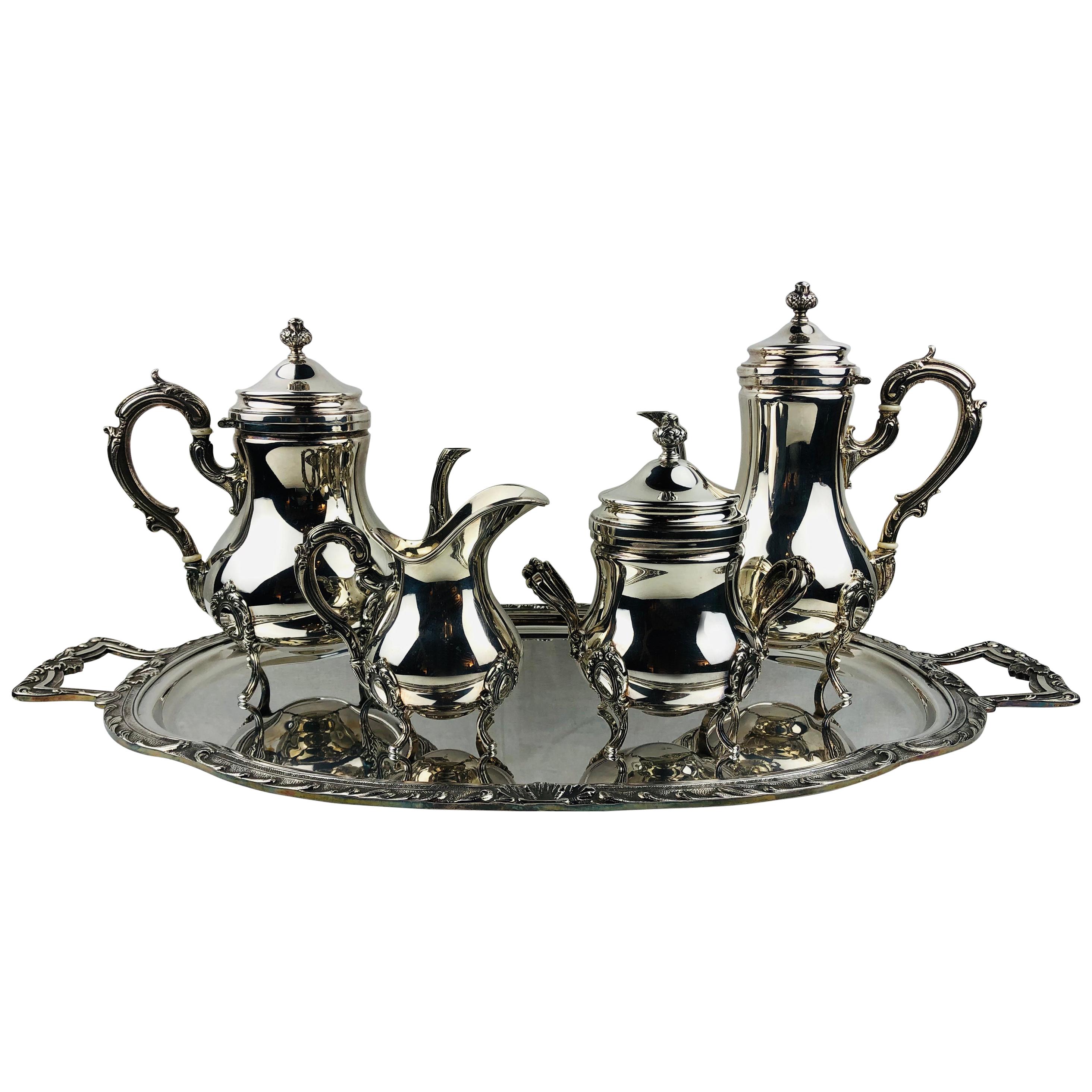 Service à thé et à café cinq pièces en métal argenté du XXe siècle