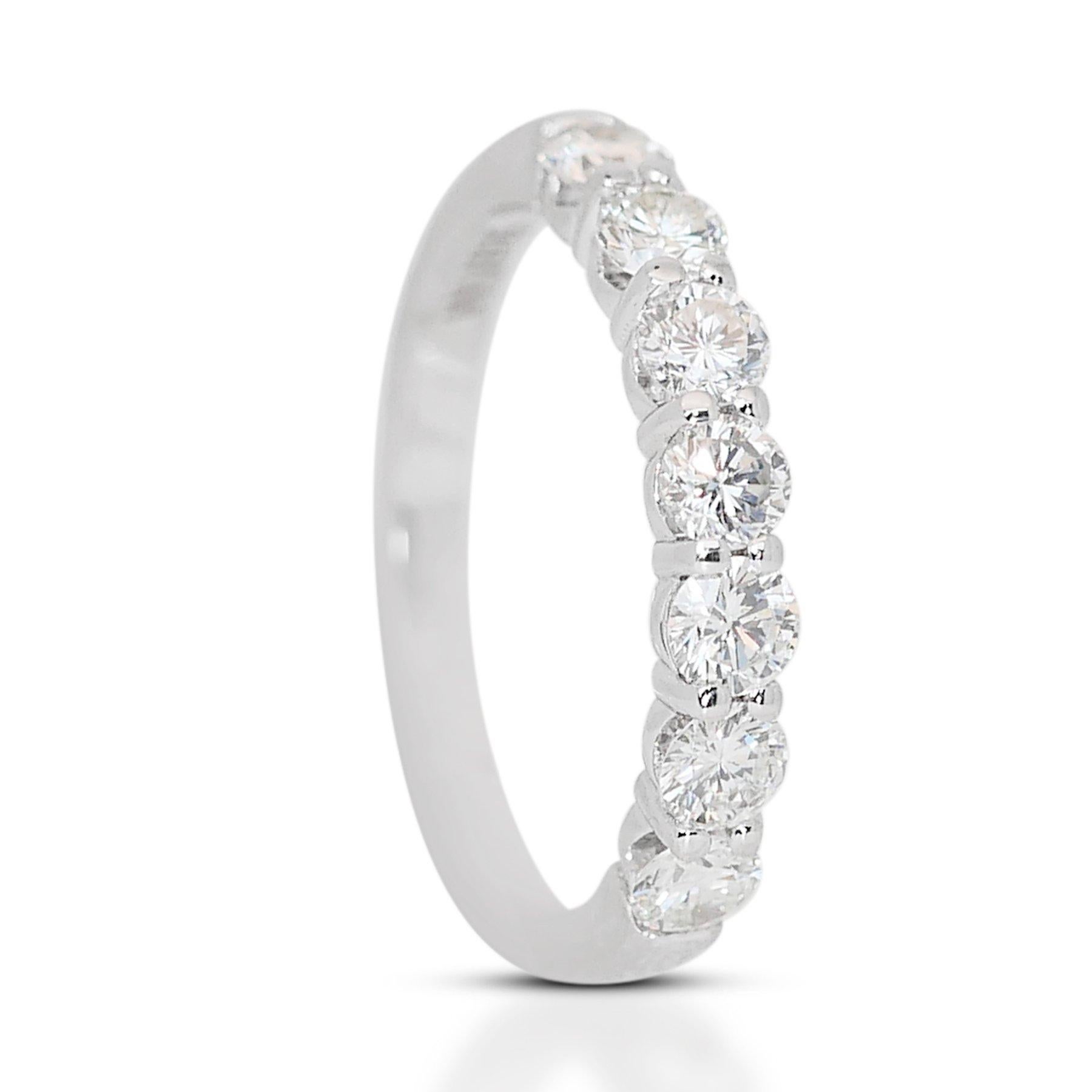 Stunning 2.10ct Diamonds 7-Stone Ring in 18k White Gold - GIA Certified

This exquisite 18k white gold 7-stone ring showcases a dazzling array of seven round diamonds, totaling 2.10 carats, each one chosen for its exceptional quality. The diamonds